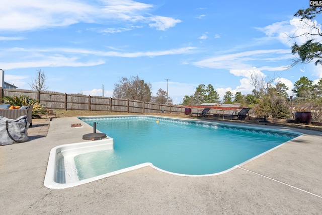 view of swimming pool featuring a patio area, a fenced backyard, and a fenced in pool