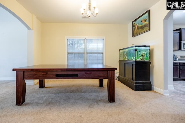 game room with arched walkways, a notable chandelier, light colored carpet, visible vents, and baseboards