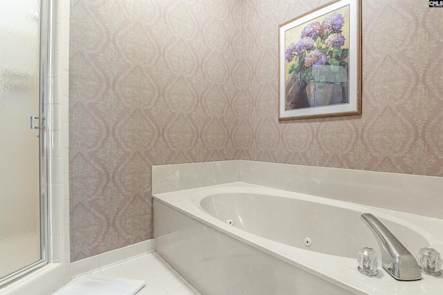 full bath featuring tile patterned floors, a jetted tub, a shower stall, and wallpapered walls