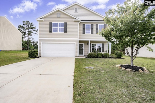 view of front of property featuring an attached garage, driveway, and a front yard