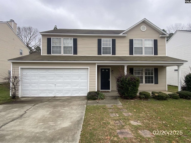 traditional home featuring a porch, concrete driveway, and a garage