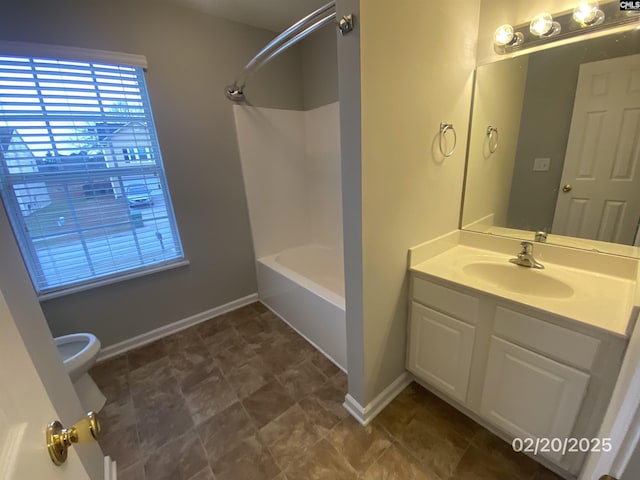 bathroom featuring toilet, bathing tub / shower combination, vanity, and baseboards