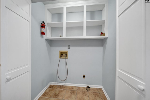 laundry room with hookup for a washing machine, laundry area, hookup for an electric dryer, and baseboards