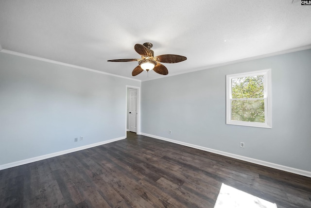 unfurnished room featuring crown molding, dark wood-type flooring, a textured ceiling, and baseboards