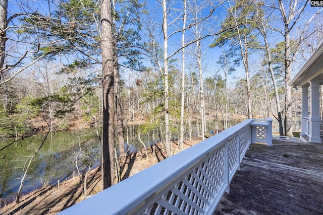 exterior space featuring a forest view