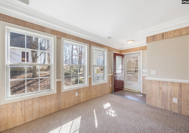 unfurnished sunroom featuring visible vents