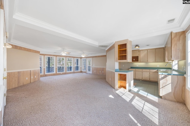 kitchen with visible vents, open shelves, crown molding, and wainscoting