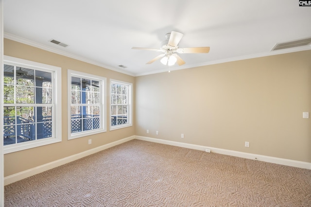 empty room with visible vents and baseboards