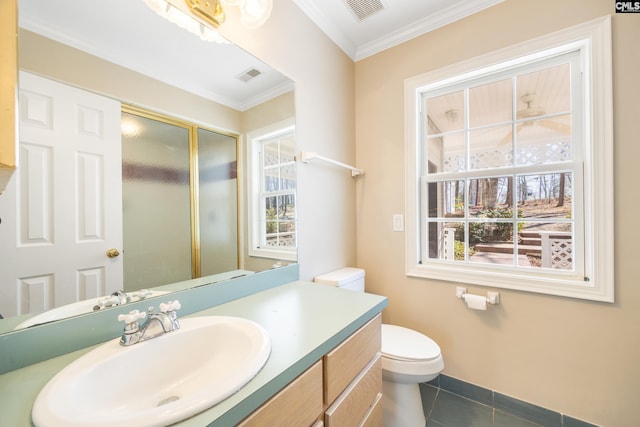 bathroom with visible vents, toilet, tile patterned flooring, crown molding, and vanity