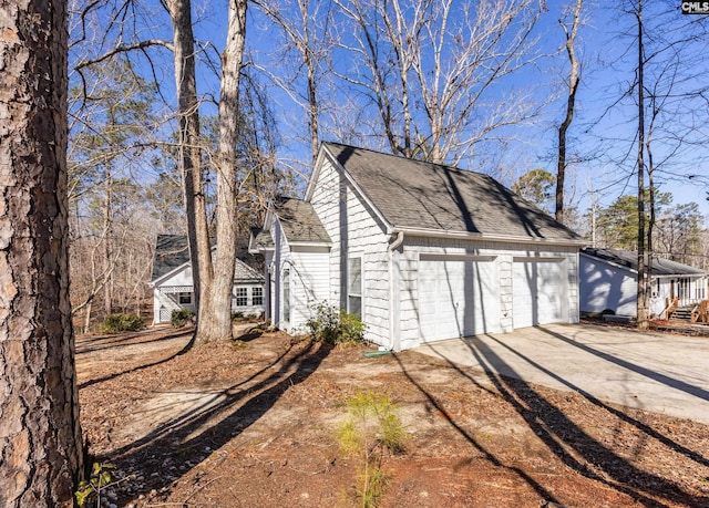 garage featuring driveway