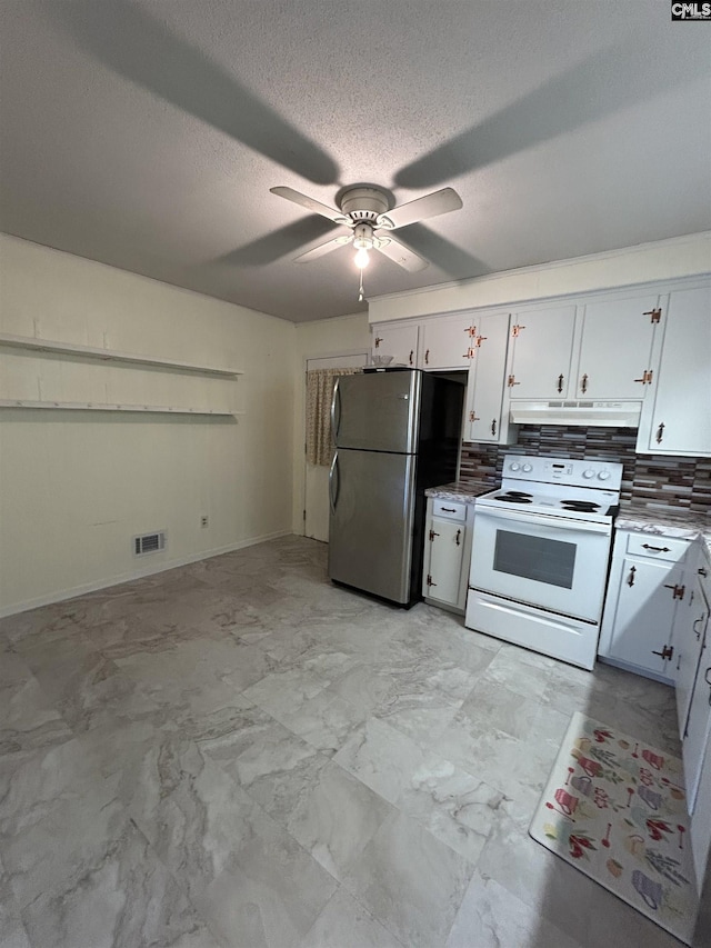 kitchen featuring white electric stove, visible vents, decorative backsplash, freestanding refrigerator, and under cabinet range hood