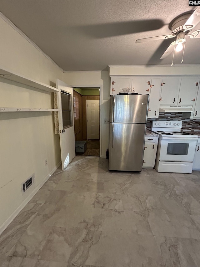 kitchen featuring white cabinets, freestanding refrigerator, marble finish floor, white electric range, and under cabinet range hood