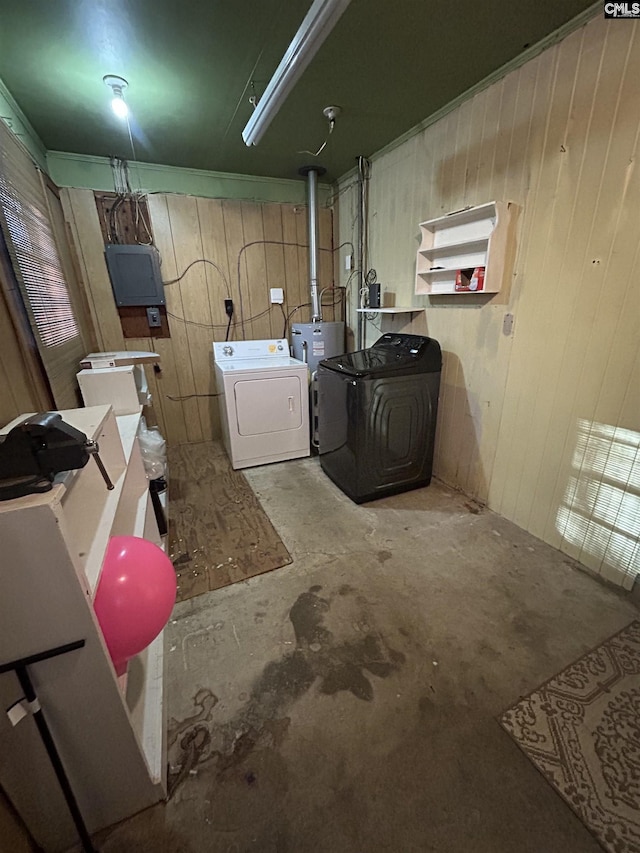 finished below grade area with washer and dryer, water heater, and wooden walls