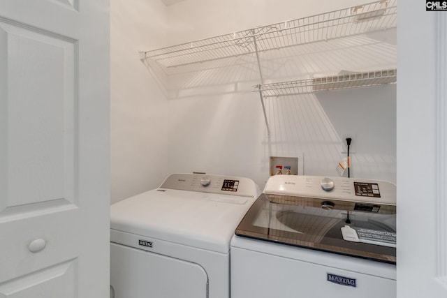 laundry area with laundry area and washer and dryer