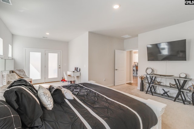 bedroom with recessed lighting, visible vents, baseboards, and light colored carpet