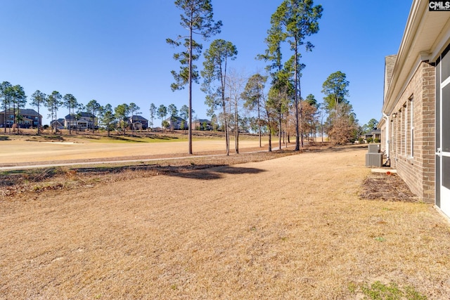 view of yard featuring central AC