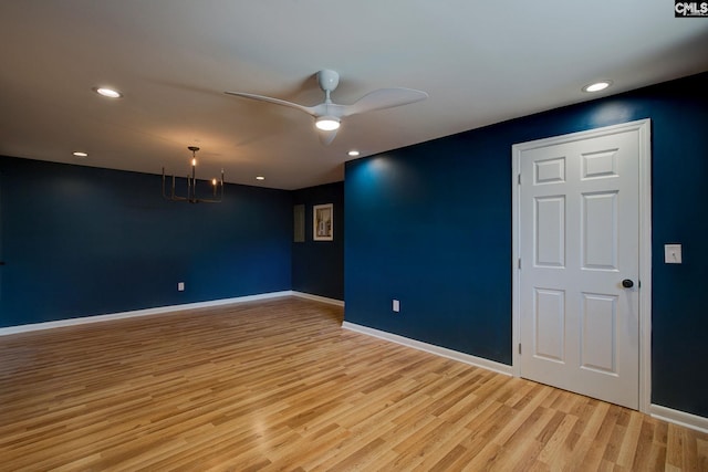 unfurnished room with light wood finished floors, recessed lighting, a ceiling fan, and baseboards