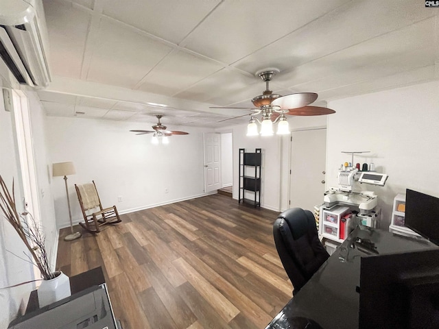 office area with ceiling fan, an AC wall unit, and wood finished floors