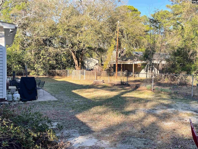 view of yard with a fenced backyard