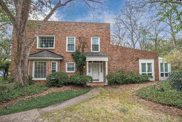 view of front of property featuring brick siding