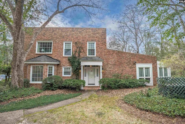 view of front of home with brick siding