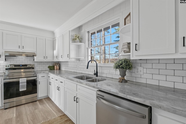 kitchen with open shelves, under cabinet range hood, stainless steel appliances, and a sink