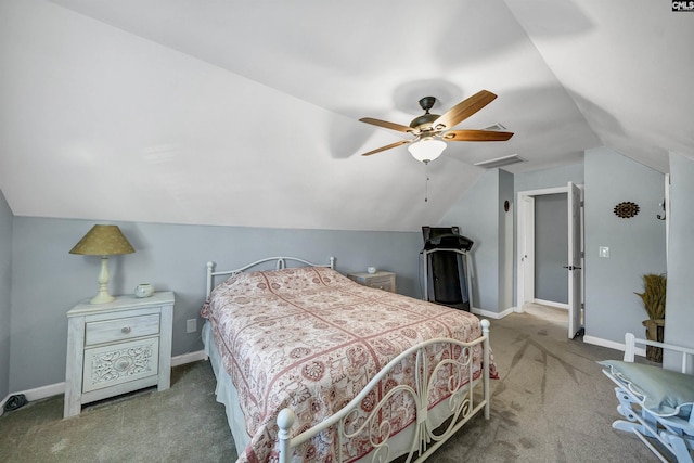 bedroom featuring carpet floors, baseboards, visible vents, and vaulted ceiling