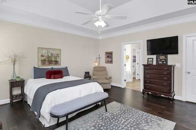 bedroom with crown molding, ceiling fan, wood finished floors, and baseboards