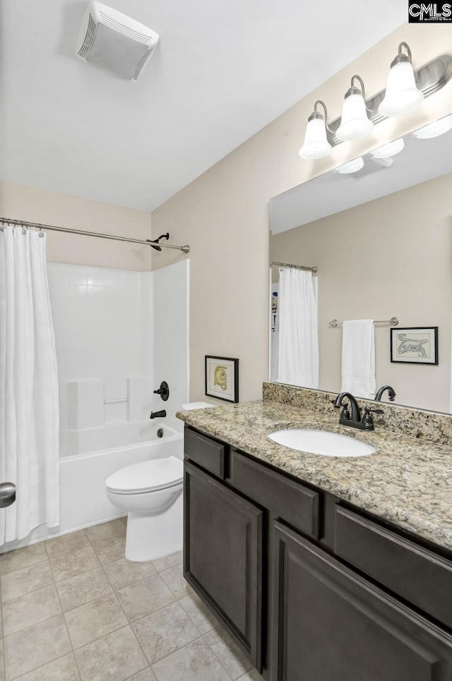 bathroom featuring shower / tub combo with curtain, visible vents, toilet, vanity, and tile patterned flooring