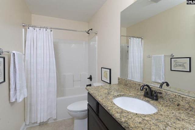 full bath with toilet, tile patterned flooring, shower / bath combo, and vanity