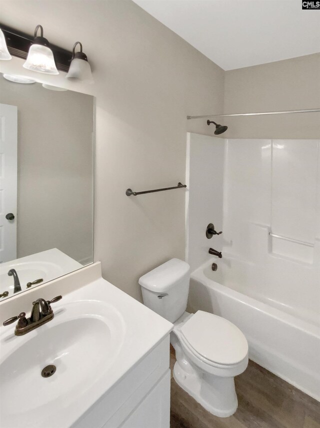 150 Grey Oaks Ln, Lexington, SC 29072 - bathroom with toilet, vanity, wood finished floors, and shower / bathing tub combination