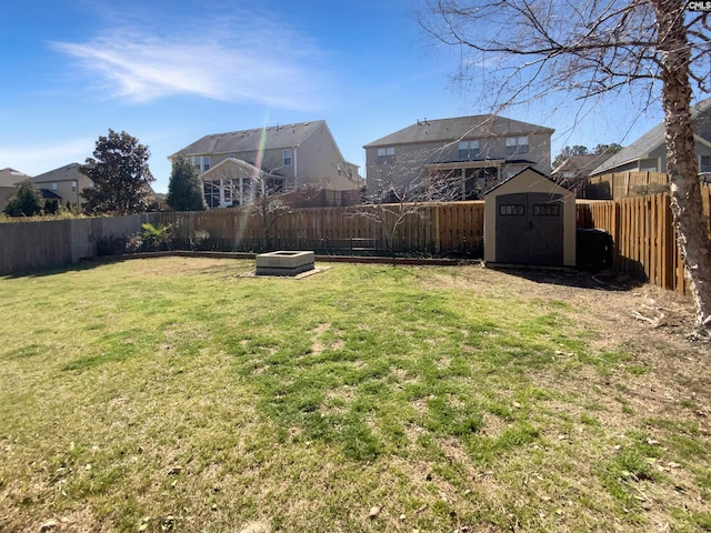 150 Grey Oaks Ln, Lexington, SC 29072 - view of yard featuring a storage shed, a fenced backyard, and an outbuilding