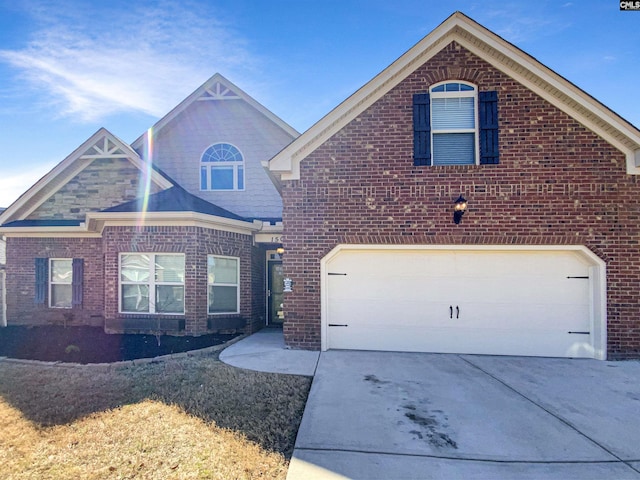 150 Grey Oaks Ln, Lexington, SC 29072 - view of front of home with driveway, a garage, and brick siding