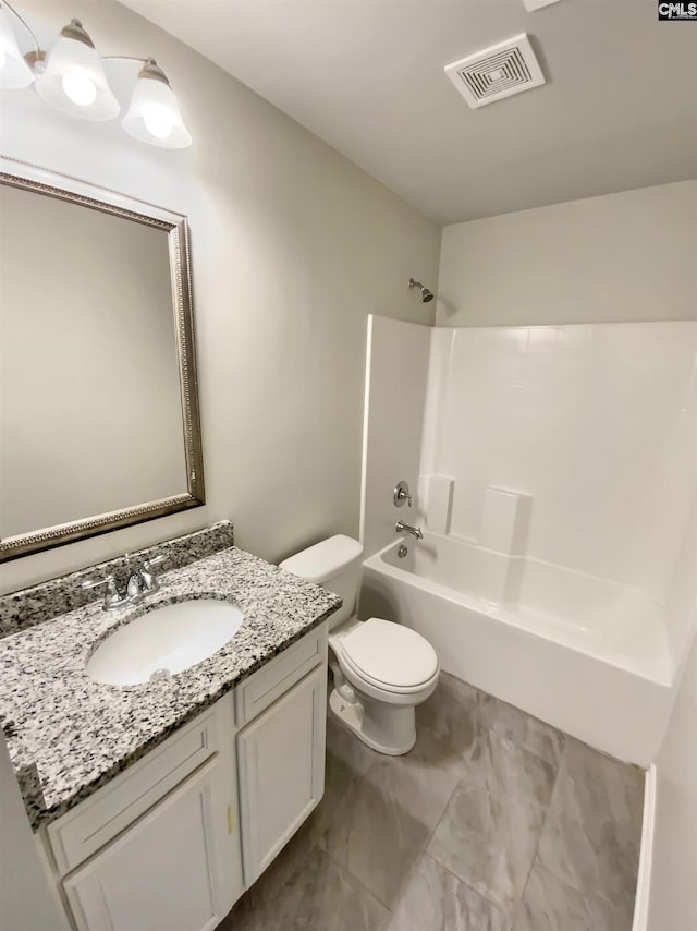 bathroom featuring toilet, shower / tub combination, visible vents, and vanity