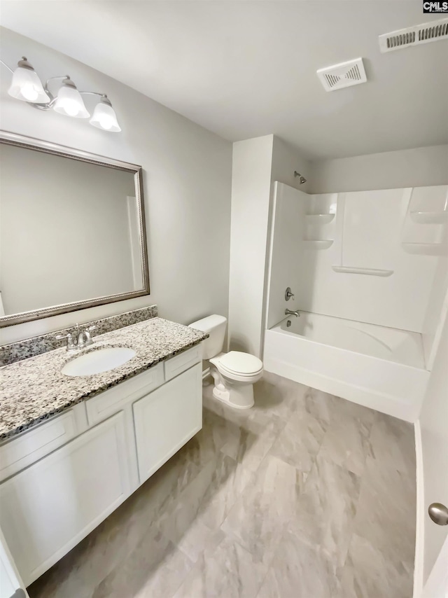 bathroom with visible vents, bathing tub / shower combination, toilet, and vanity