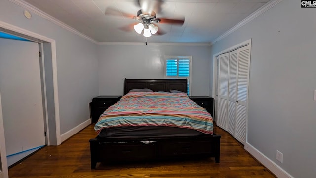 bedroom with baseboards, a closet, ornamental molding, and wood finished floors