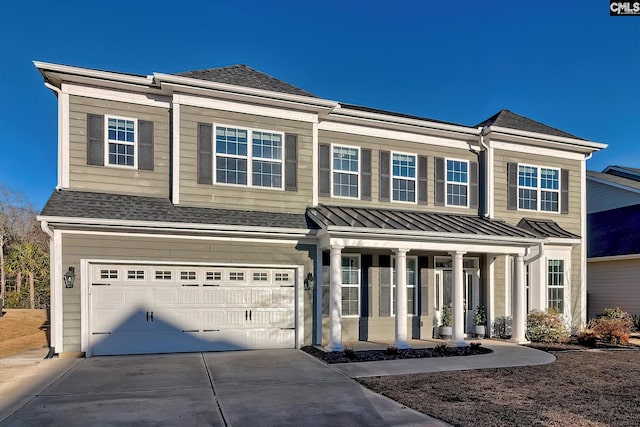 view of front of property with a porch, concrete driveway, roof with shingles, and an attached garage