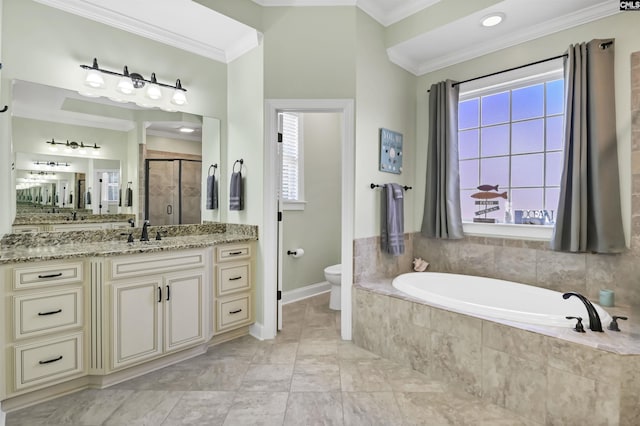 bathroom with a stall shower, toilet, ornamental molding, vanity, and a bath