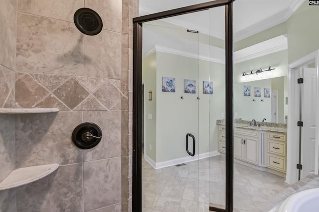 bathroom featuring vanity, baseboards, visible vents, a shower stall, and crown molding