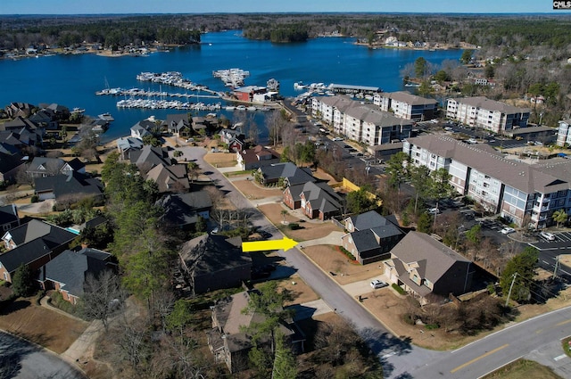 bird's eye view with a water view