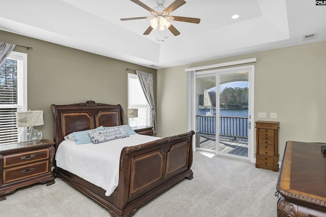 547 Harbor Heights Dr, Lexington, SC 29072 - bedroom featuring light carpet, a raised ceiling, visible vents, and access to exterior