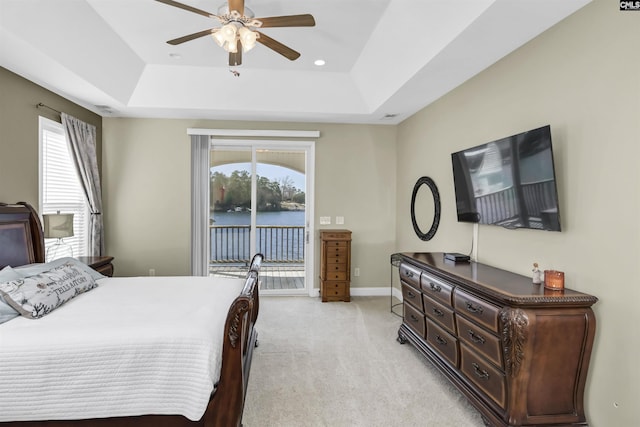 547 Harbor Heights Dr, Lexington, SC 29072 - bedroom featuring light carpet, a tray ceiling, baseboards, and access to exterior