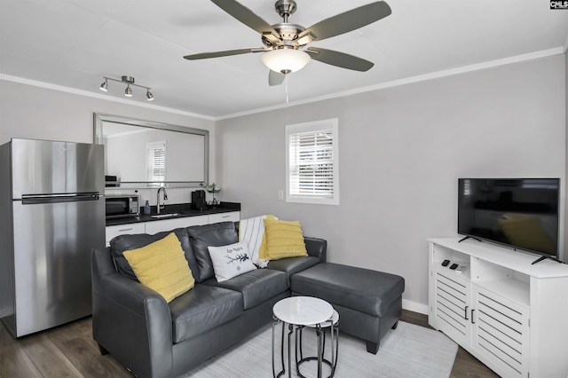 547 Harbor Heights Dr, Lexington, SC 29072 - living area featuring ornamental molding, ceiling fan, baseboards, and wood finished floors