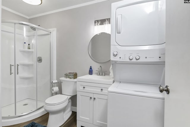 547 Harbor Heights Dr, Lexington, SC 29072 - full bath with crown molding, toilet, a stall shower, stacked washer / dryer, and wood finished floors