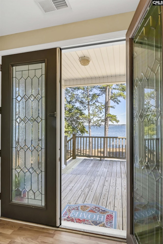547 Harbor Heights Dr, Lexington, SC 29072 - doorway with visible vents, a water view, and wood finished floors
