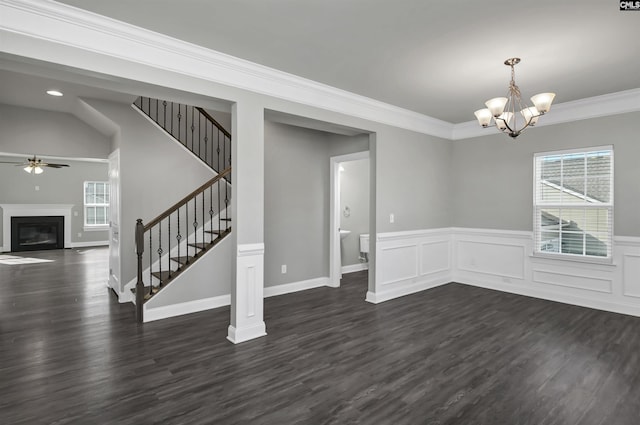 interior space with dark wood-style floors, plenty of natural light, and stairway