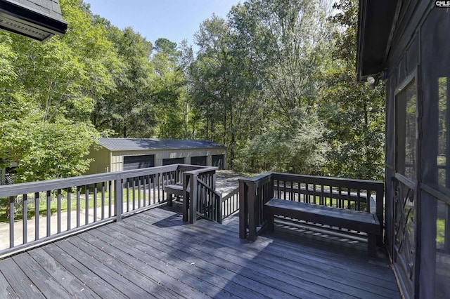 deck featuring an outbuilding