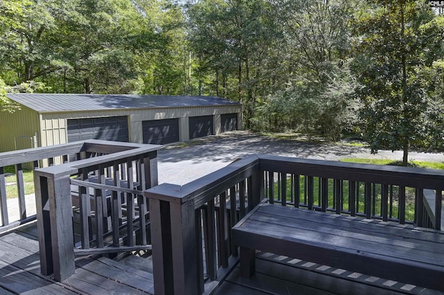 wooden terrace featuring an outdoor structure