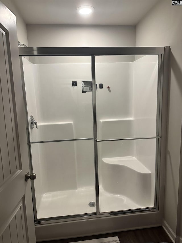 bathroom with a stall shower