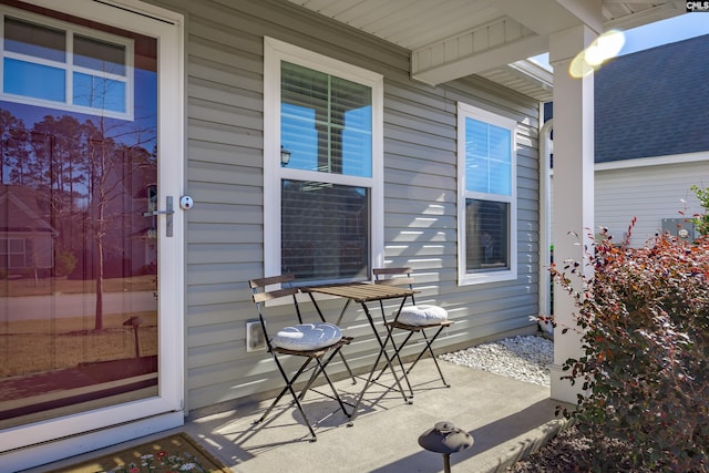 entrance to property featuring a porch